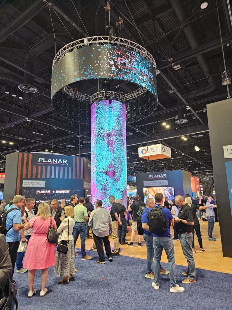 Centrifuge Media at InfoComm 2025 – Fausto Turro and Tanner Highland walking the floor. Large LED Column and 360 LED Display